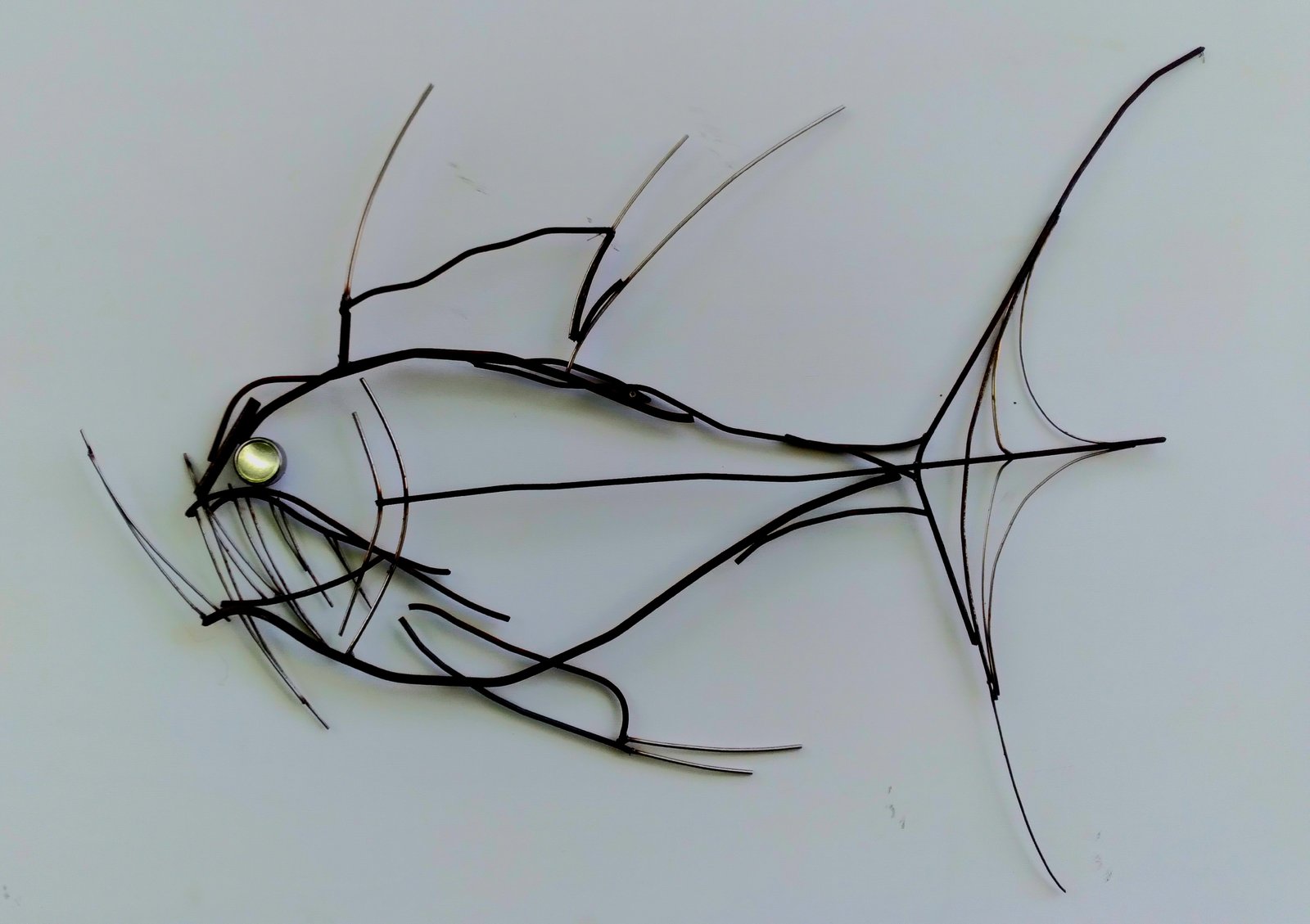 Fish in metal